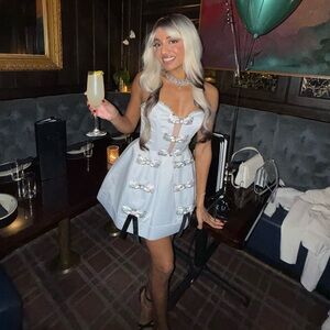 Brand new only worn once glitzy bow cocktail dress